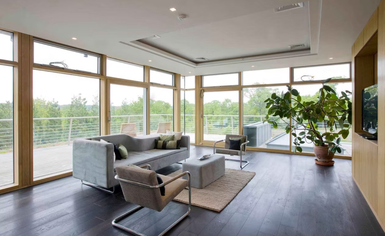 Seafield House — piano nobile living space with floor-to-ceiling glazing